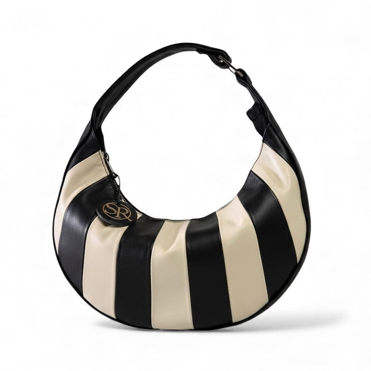 black and cream patchwork half moon bag
