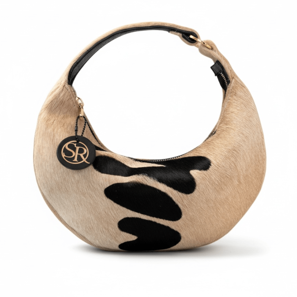 black and cream patchwork half moon bag