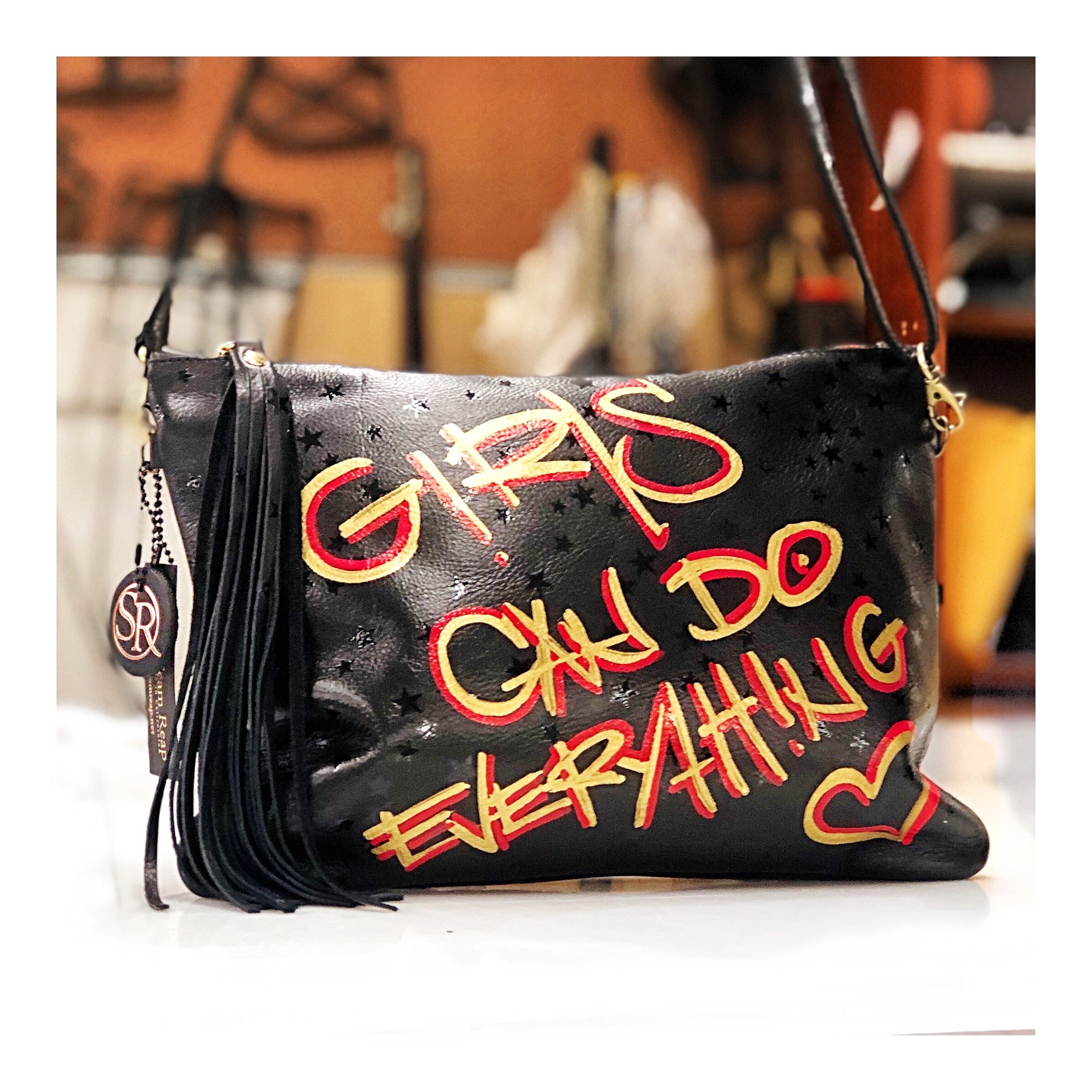 Graffiti store clutch bag